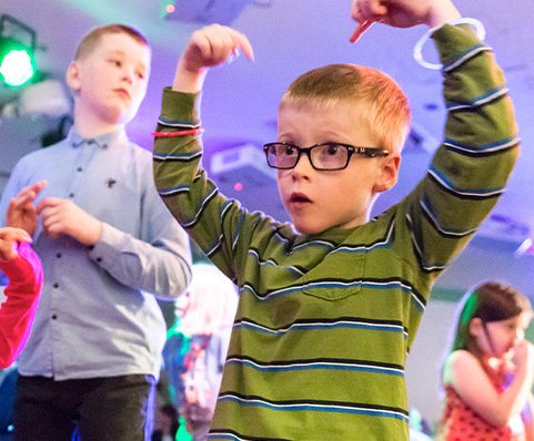 Children dancing at a disco