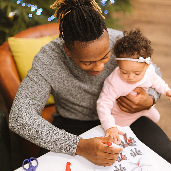 Father and baby colouring decorations