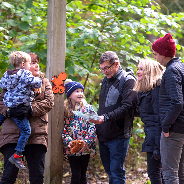 Family taking part in activity trail