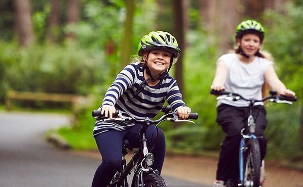 Two girls on a bike ride