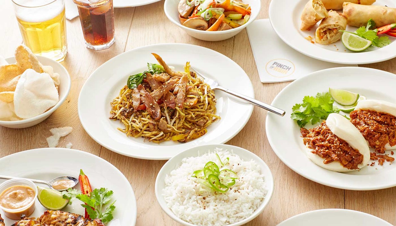 A table full of chinese takeaway dishes from A Pinch of Asia