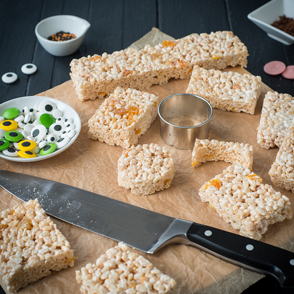 Rice crispy cakes on a chopping board