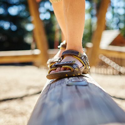 Child crossing balance beam