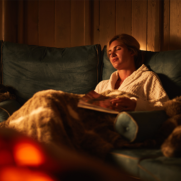 Woman relaxing in a lodge